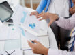 Leaders reviewing occupational health program consistency across multiple locations