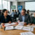 Team conducting occupational health program reviews
